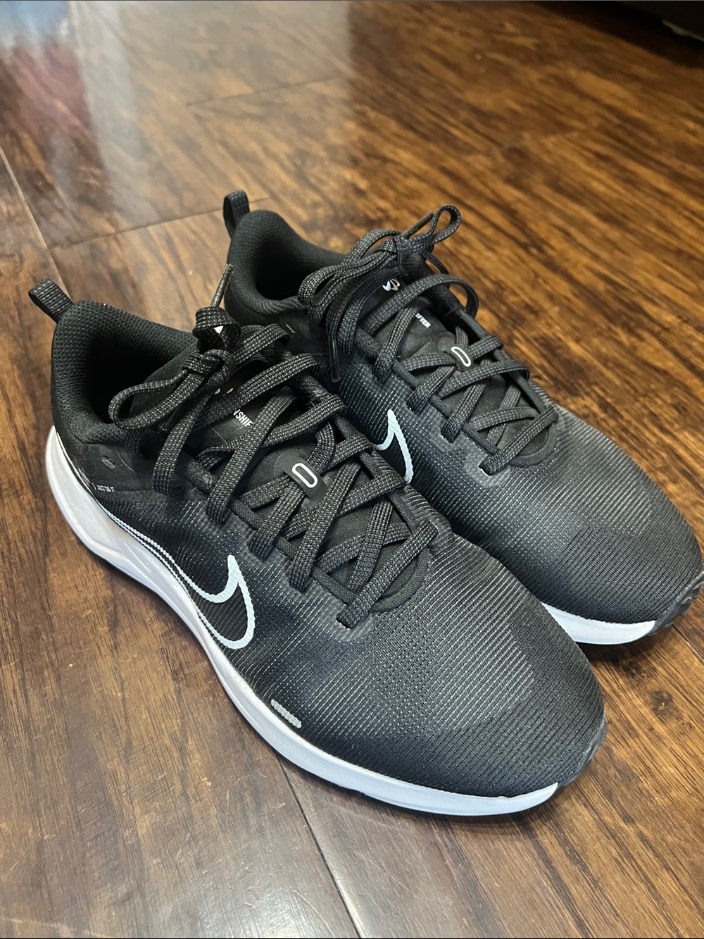 Nike Black Athletic Running Shoes with White Swoosh